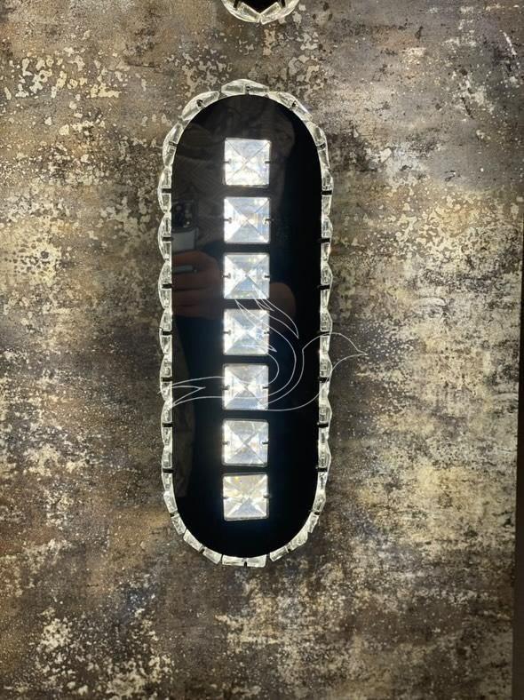 دیوارکوب کهکشانی بیضی